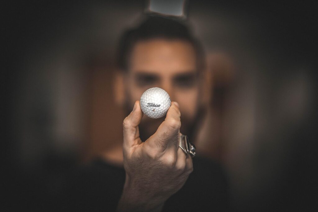 man holding a golf ball